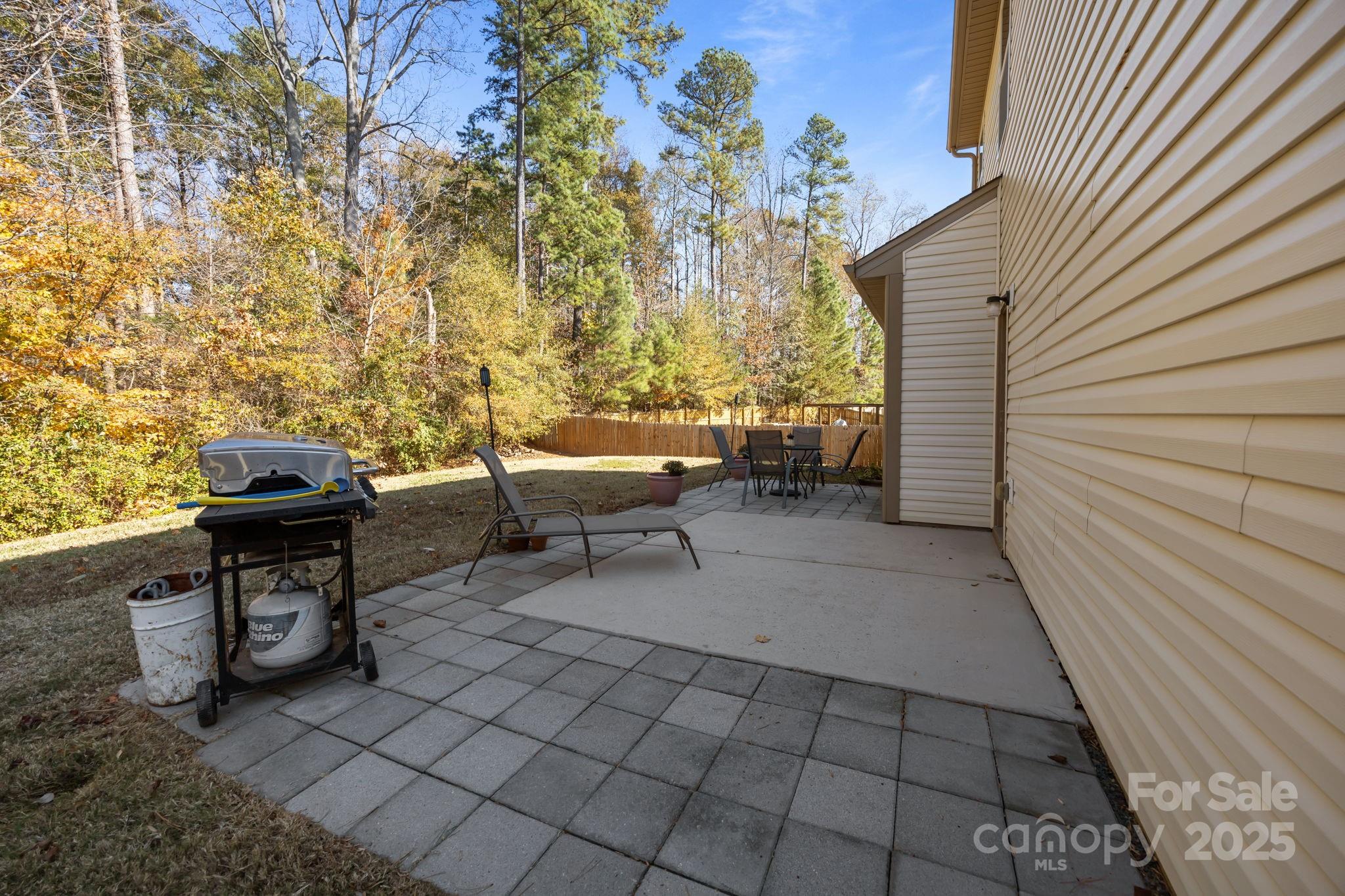 125 Devynn Ridge Court Mount Holly, NC 28120 - Photo 23 of 47 a view of a terrace with chairs