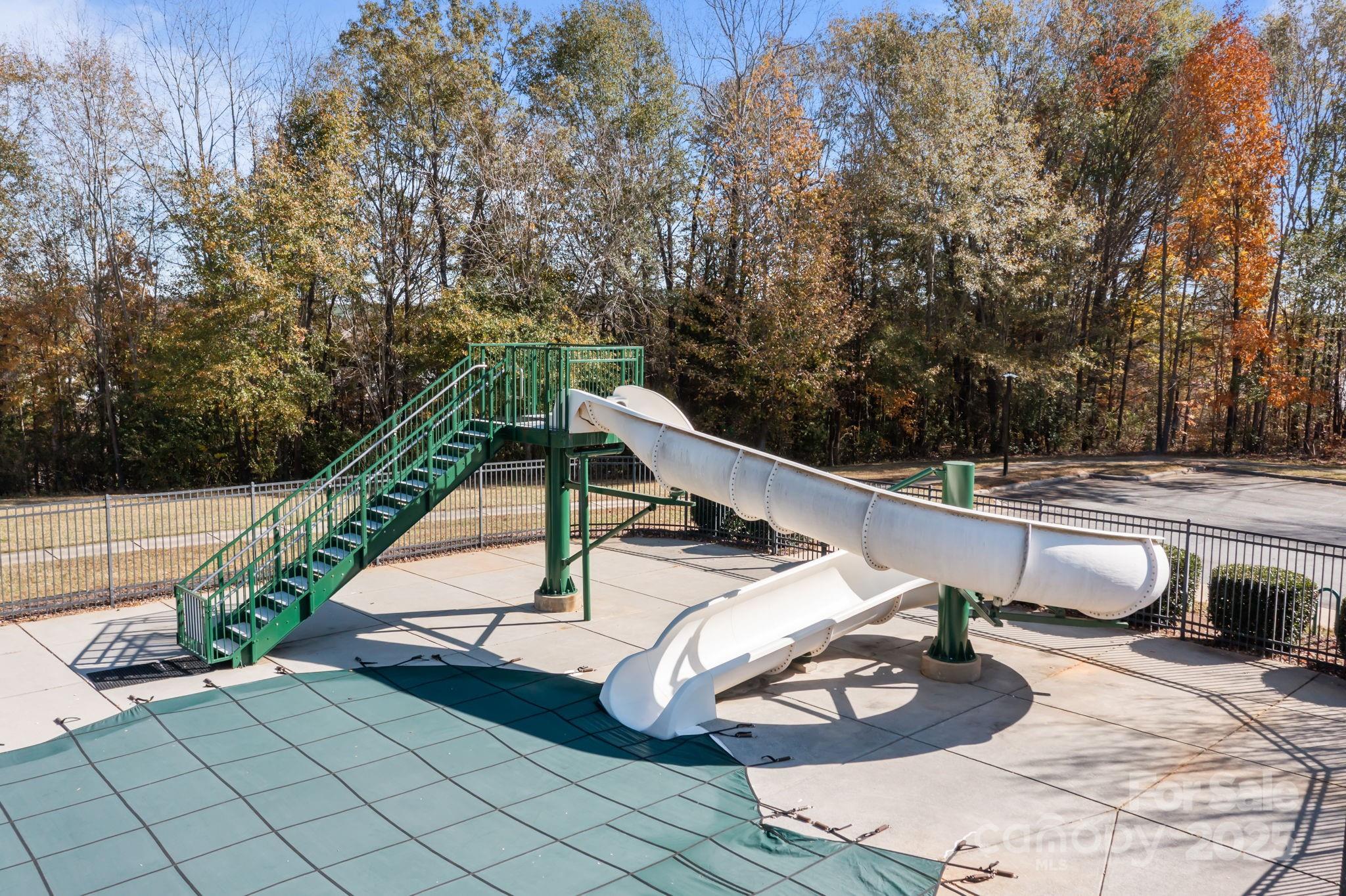 125 Devynn Ridge Court Mount Holly, NC 28120 - Photo 32 of 47 a view of a two chairs in the roof deck