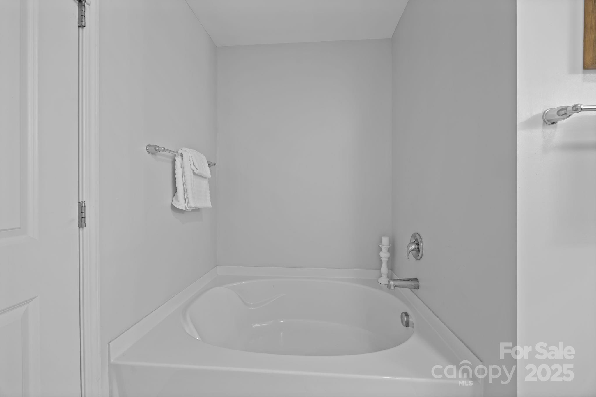 125 Devynn Ridge Court Mount Holly, NC 28120 - Photo 46 of 47 a white bath tub sitting next to a white sink