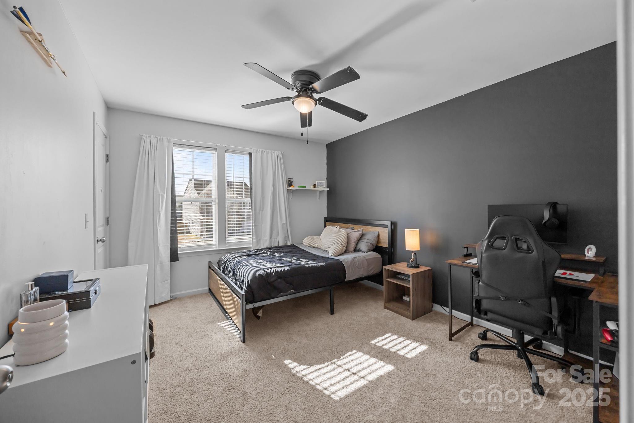 125 Devynn Ridge Court Mount Holly, NC 28120 - Photo 10 of 47 a living room with furniture and a window