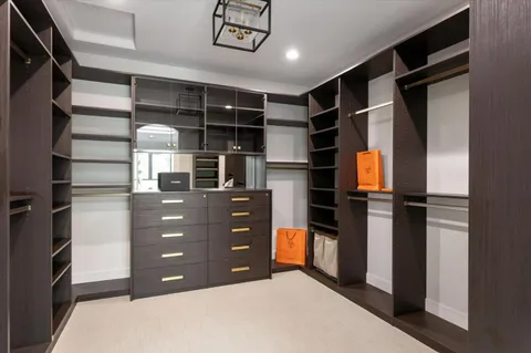 a view of a small house with wooden floor