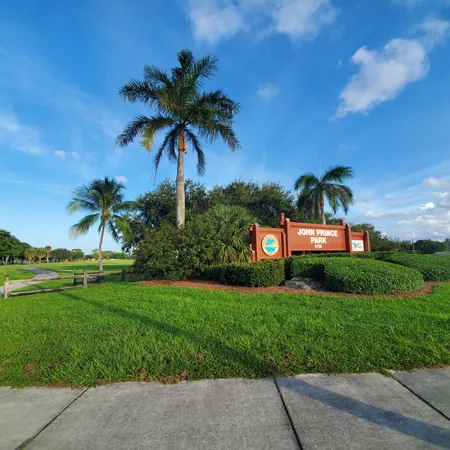 a view of a building with a yard
