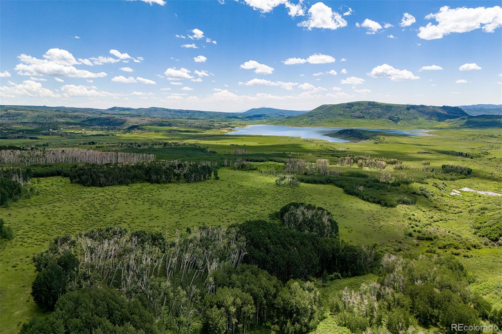 41763 H Road Dolores, CO 81323 - Photo 2 of 32 a view of a lake with a big yard
