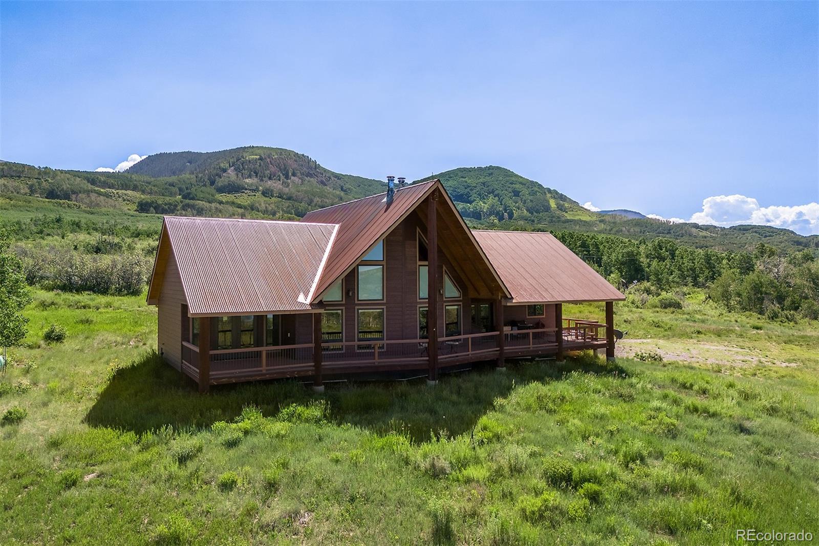 41763 H Road Dolores, CO 81323 - Photo 24 of 32 a front view of a house with a garden