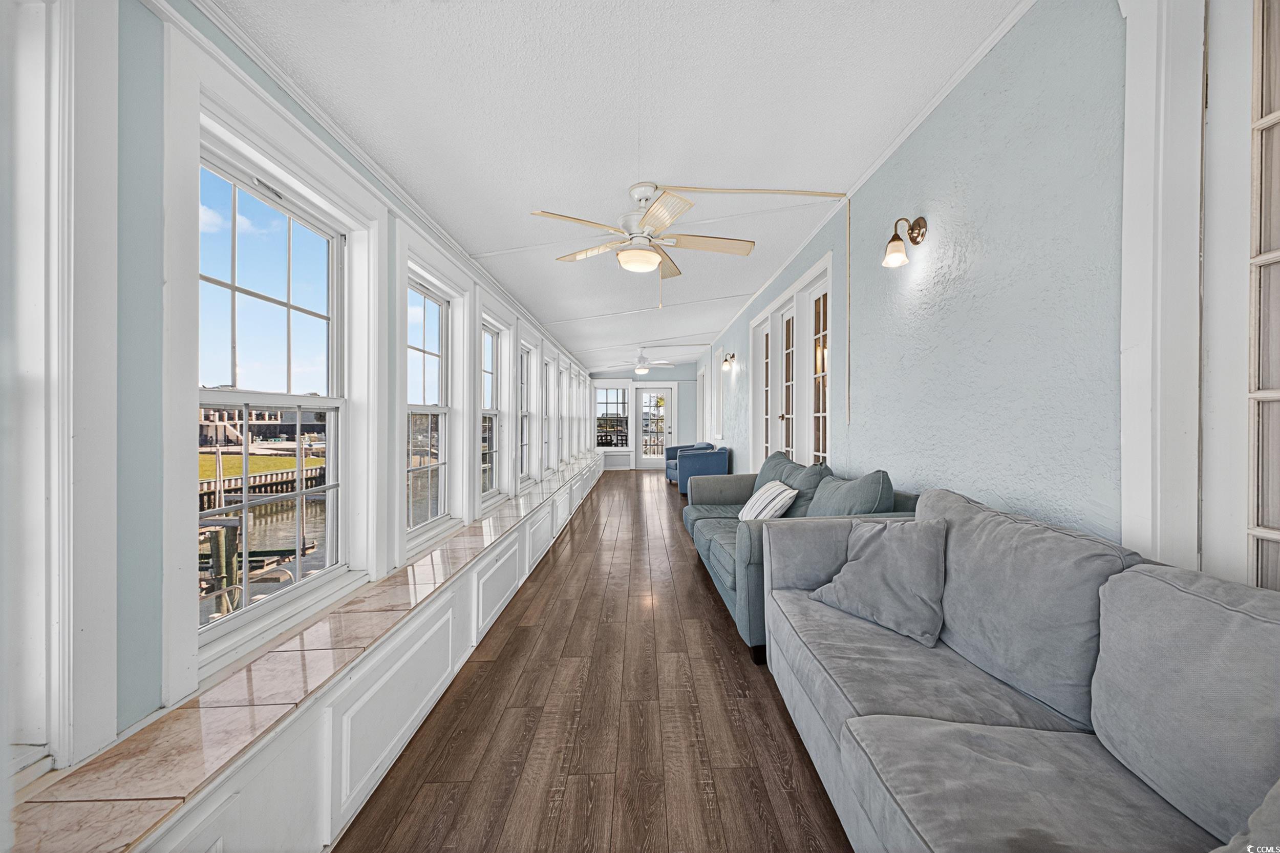 1885 Pompano Drive Murrells Inlet, SC 29576 - Photo 15 of 34 Sunroom / solarium with wood finished floors and french doors