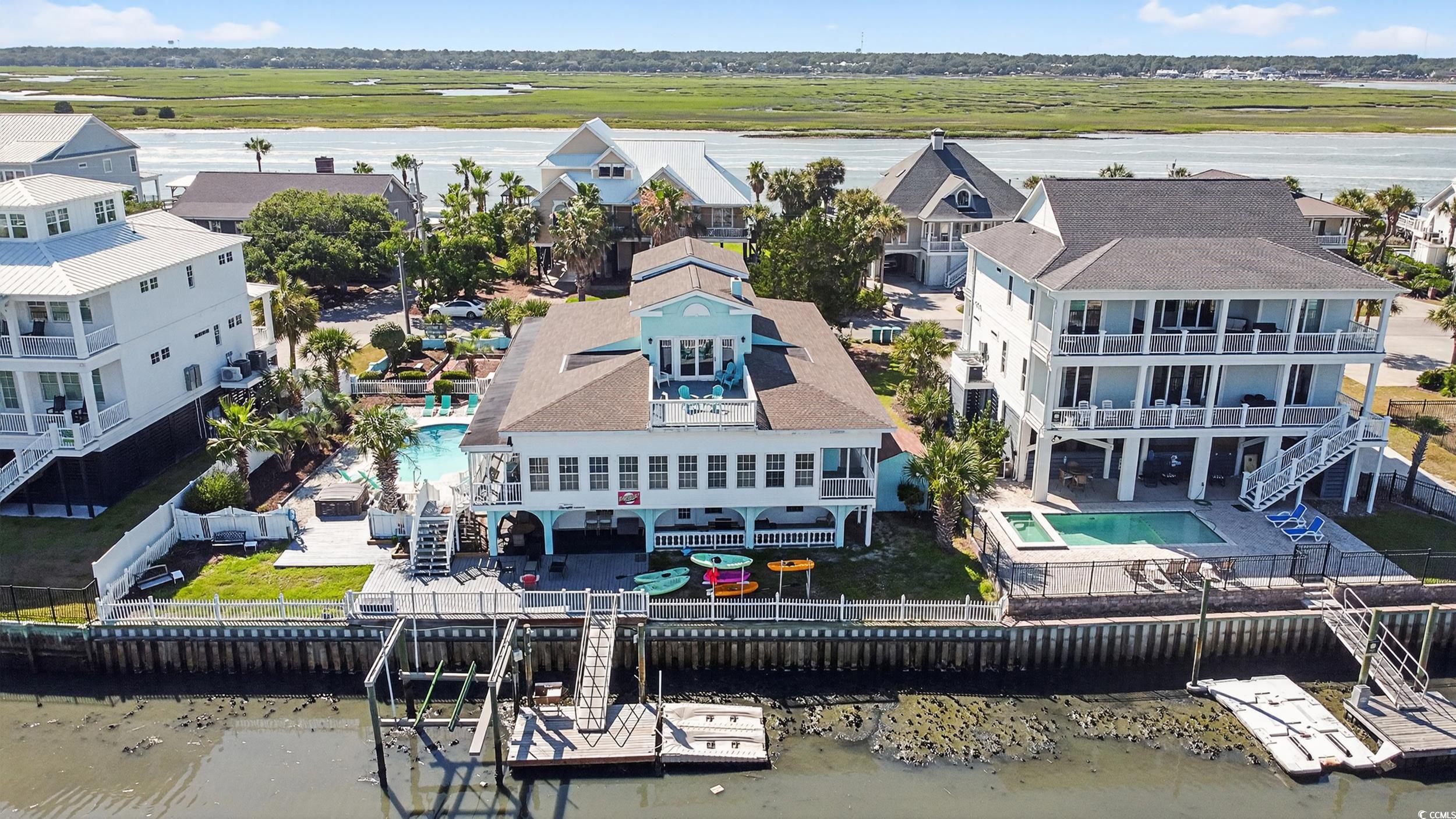 1885 Pompano Drive Murrells Inlet, SC 29576 - Photo 30 of 34 View of subject property featuring a pool area and a nearby body of water