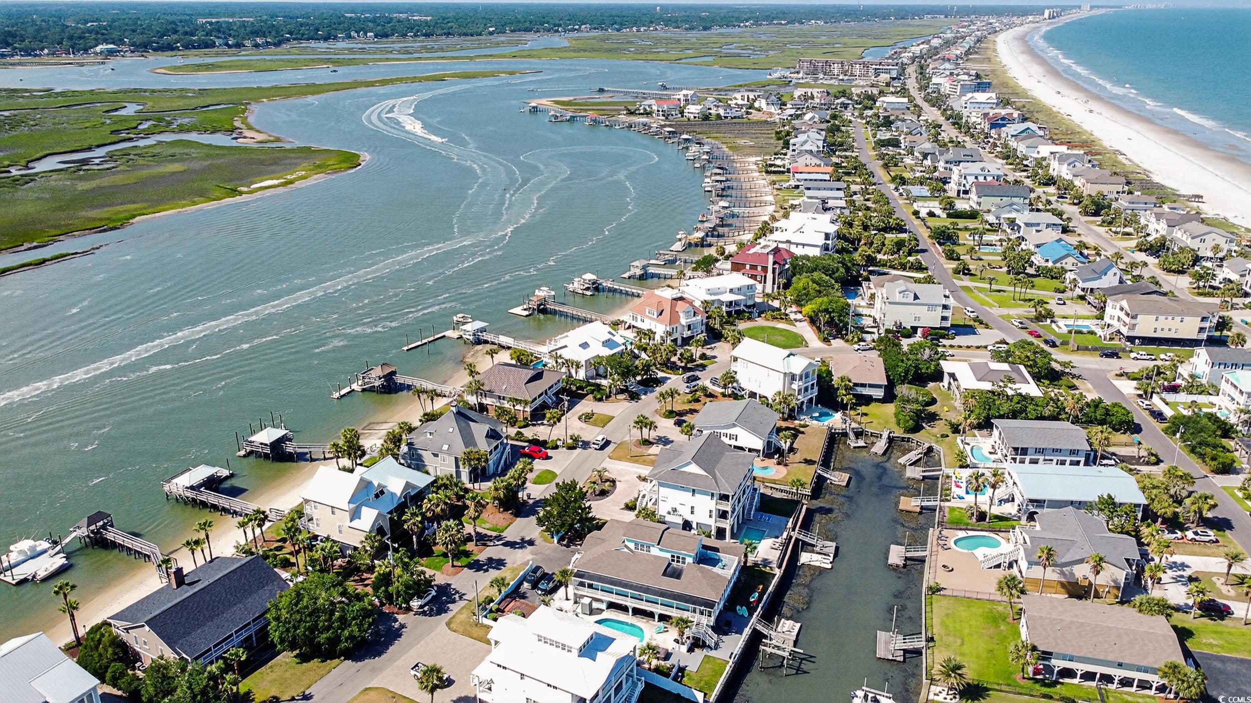 1885 Pompano Drive Murrells Inlet, SC 29576 - Photo 3 of 34 Aerial view of property and surrounding area featuring expansive coastline