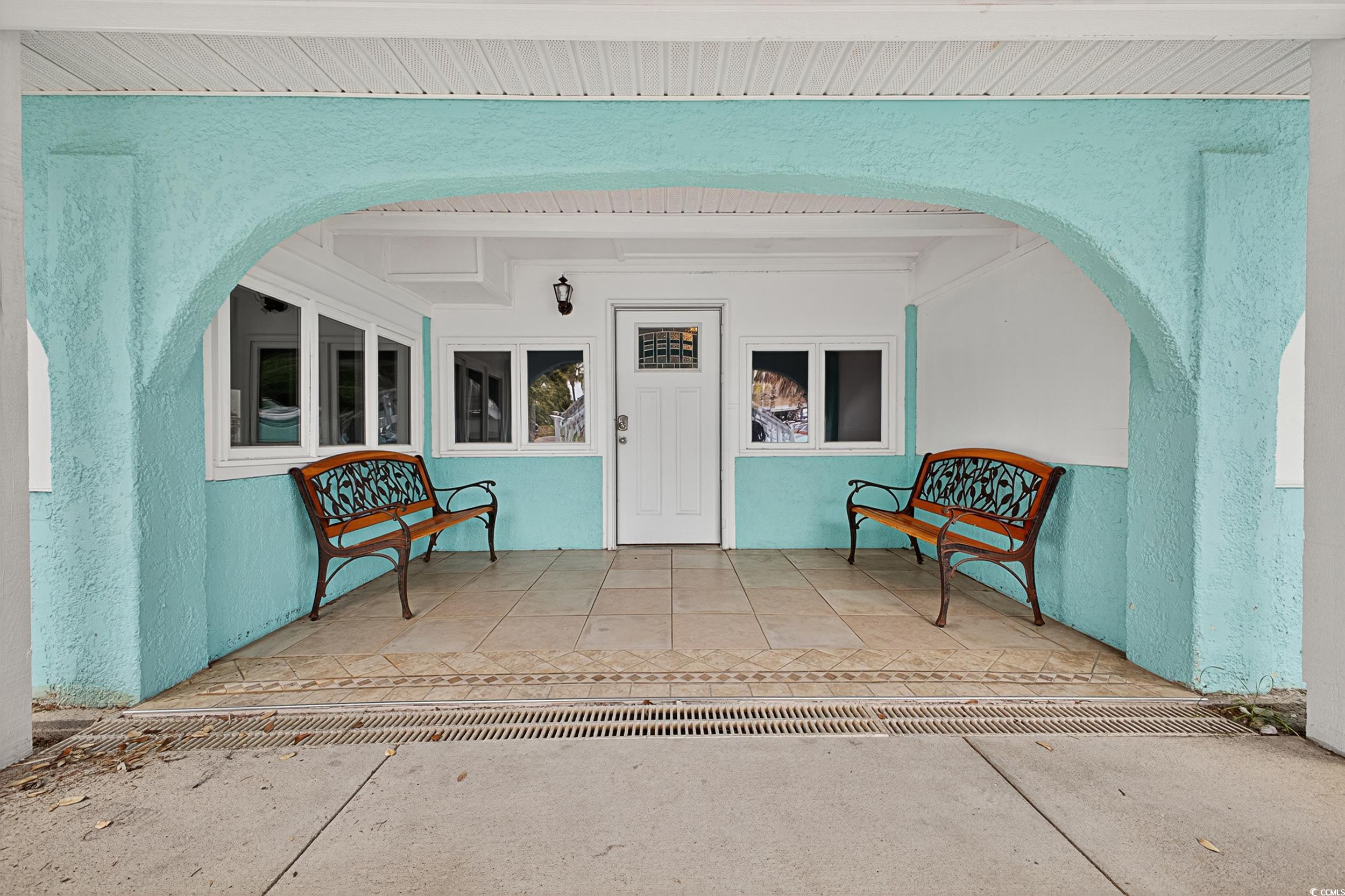 1885 Pompano Drive Murrells Inlet, SC 29576 - Photo 4 of 34 Doorway to property with stucco siding