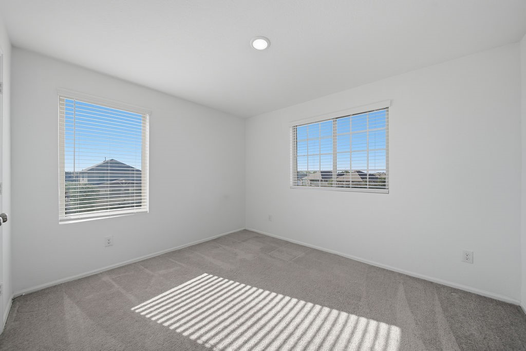14230 Overbrook Willow Way Rosharon, TX 77583 - Photo 30 of 50 a view of an empty room with a window