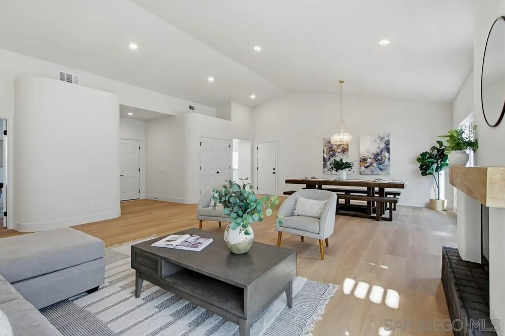 4959 Lamia Way Oceanside, CA 92056 - Photo 11 of 63 a living room with furniture and a table