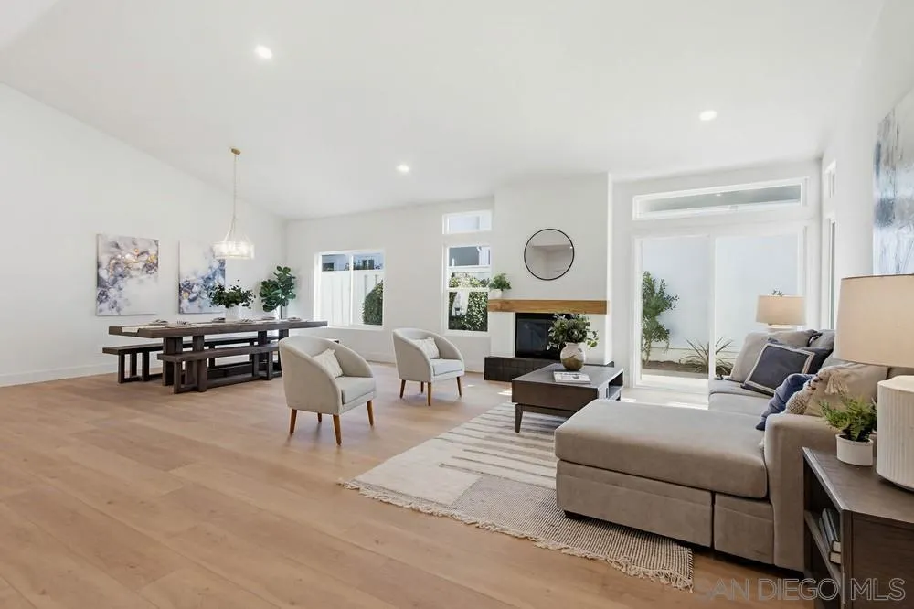 4959 Lamia Way Oceanside, CA 92056 - Photo 12 of 63 a living room with furniture and a fireplace