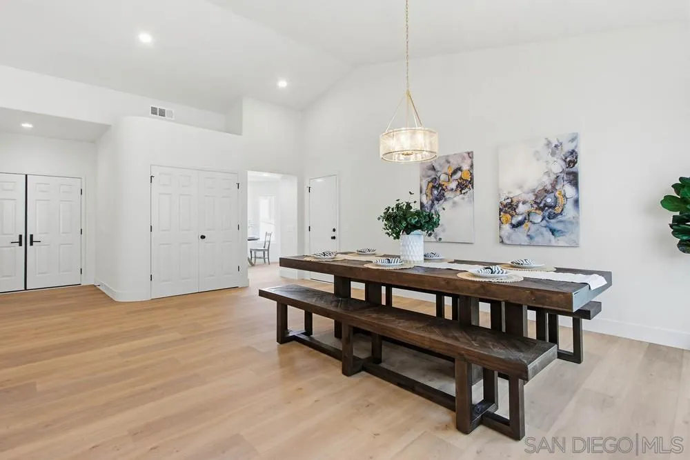 4959 Lamia Way Oceanside, CA 92056 - Photo 16 of 63 a view of a room with furniture and a chandelier