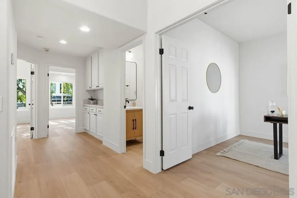 4959 Lamia Way Oceanside, CA 92056 - Photo 26 of 63 a view of empty room with wooden floor