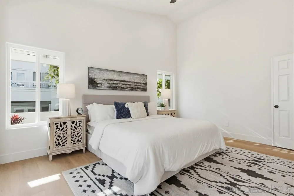 4959 Lamia Way Oceanside, CA 92056 - Photo 38 of 63 a bedroom with a bed and a window