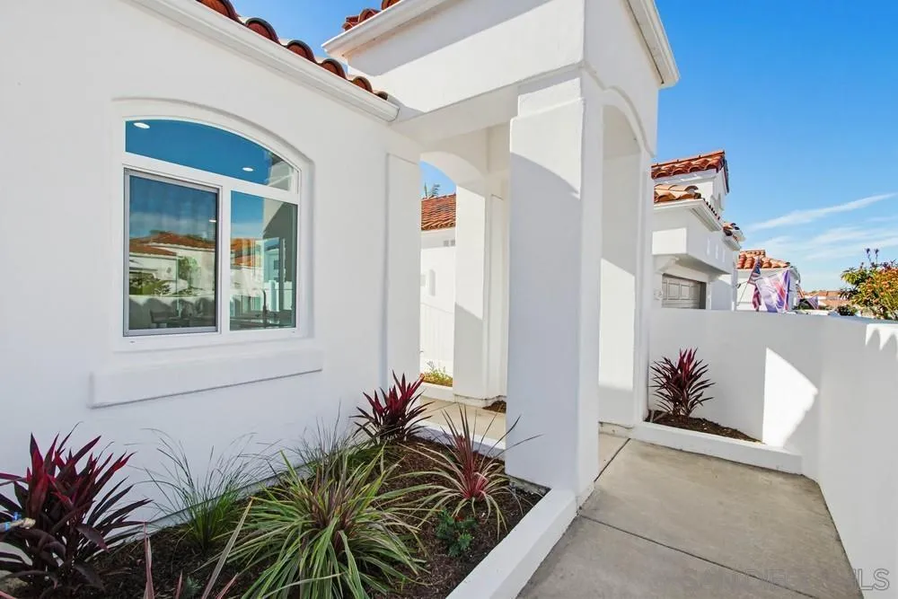 4959 Lamia Way Oceanside, CA 92056 - Photo 4 of 63 a view of front door and bedroom