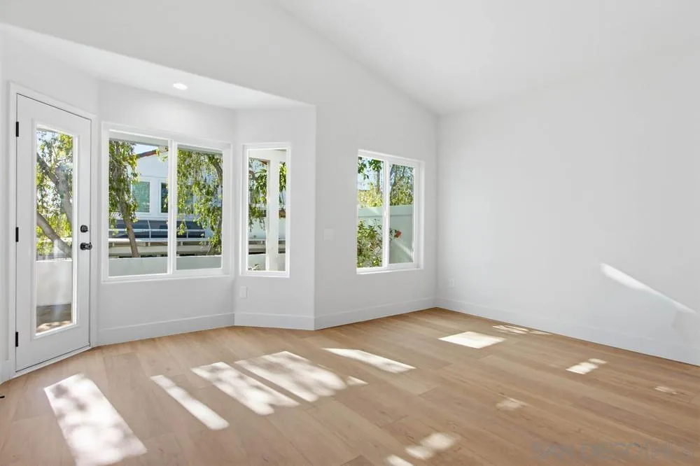 4959 Lamia Way Oceanside, CA 92056 - Photo 46 of 63 a view of an empty room with a window