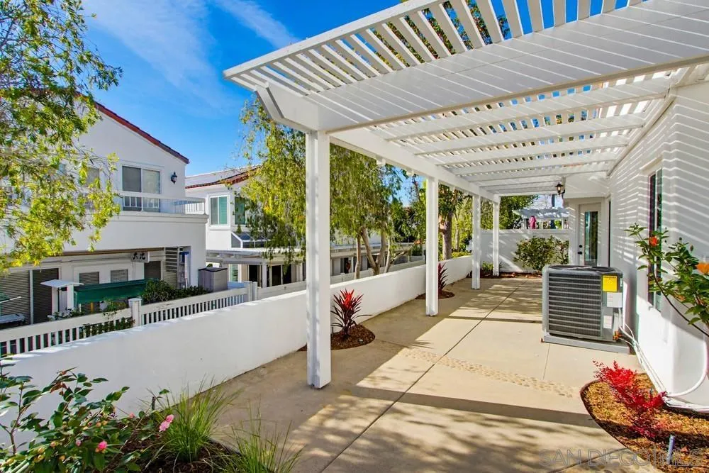 4959 Lamia Way Oceanside, CA 92056 - Photo 58 of 63 a front view of a house with a porch