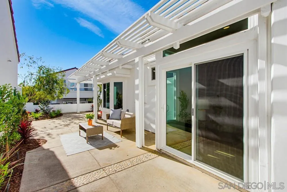 4959 Lamia Way Oceanside, CA 92056 - Photo 60 of 63 a view of a patio with table and chairs and potted plants