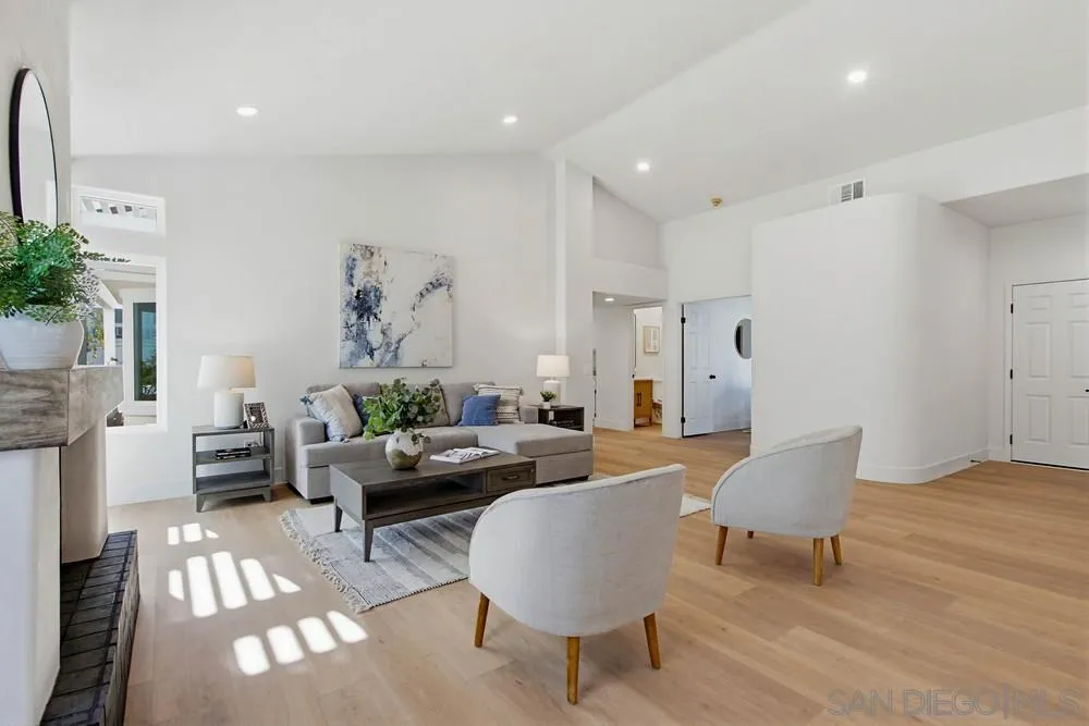 4959 Lamia Way Oceanside, CA 92056 - Photo 10 of 63 a living room with furniture and a rug