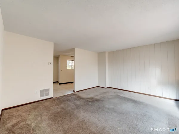 an empty room with window