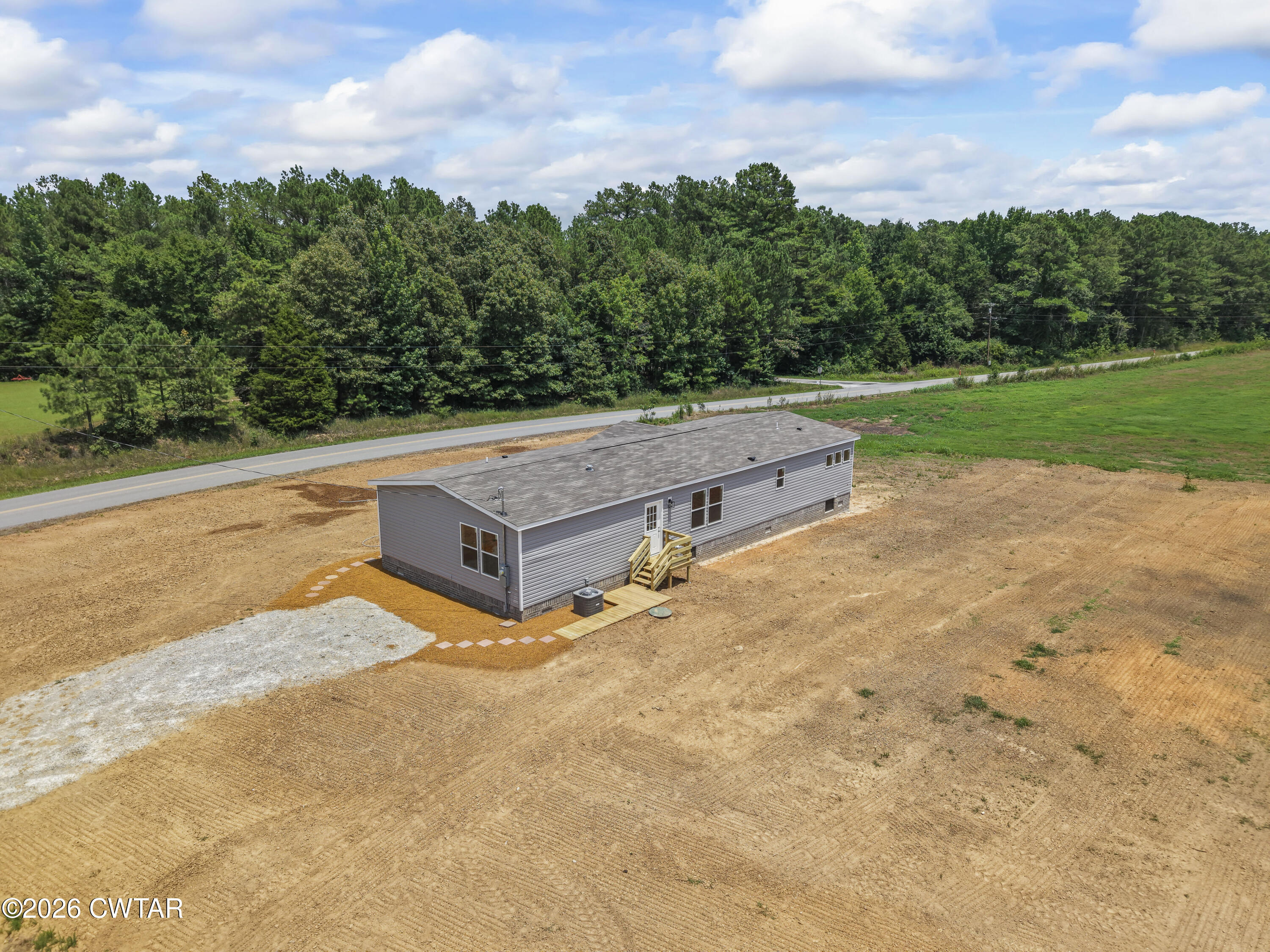 3045 Clifford Road Henderson, TN 38340 - Photo 23 of 28 DJI_20260703131740_0115_D