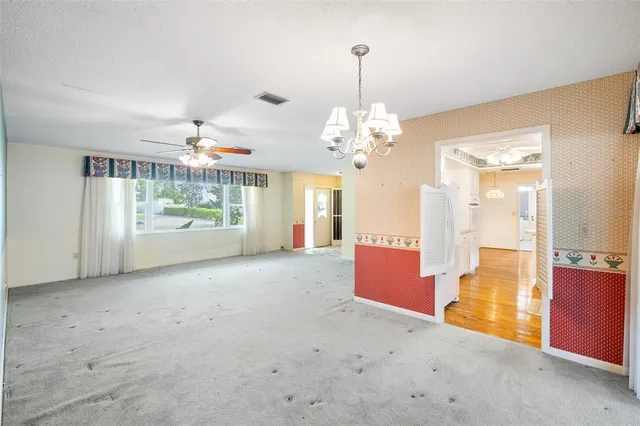 a view of a room with a chandelier