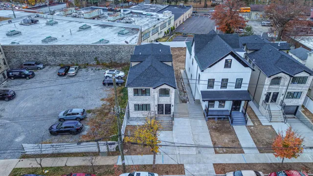 an aerial view of a house with swimming pool