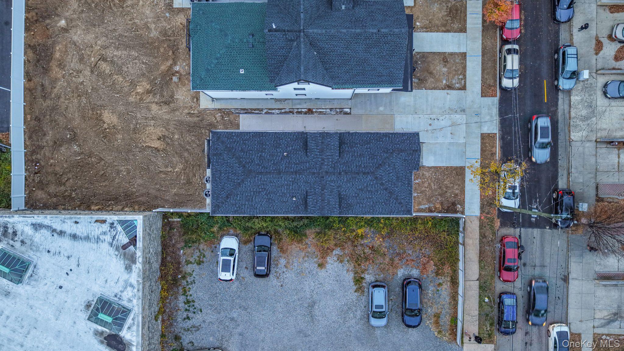 342 East 234th Street Bronx, NY 10470 - Photo 7 of 13 an aerial view of a house with entryway