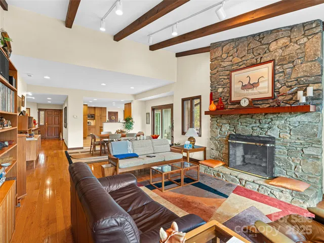 a kitchen with stainless steel appliances granite countertop wooden cabinets a sink and dishwasher