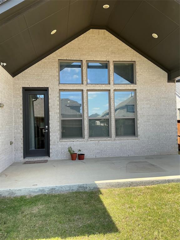 2195 English Ivy Road Frisco, TX 75033 - Photo 18 of 23 Covered outside patio area...it has a connection for a TV