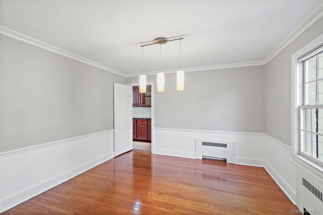 246 Mamaroneck Road Scarsdale, NY 10583 - Photo 12 of 35 Dining room with gleaming hardwood floors