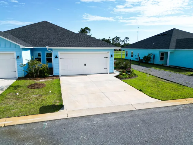 a view of a back yard of the house