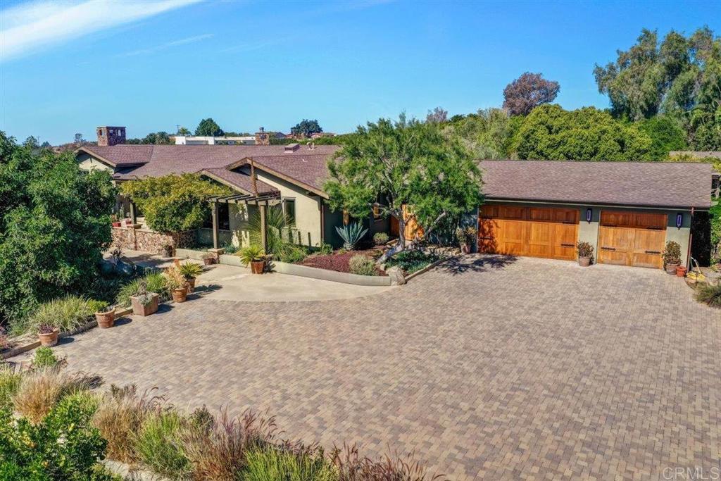 14502 Fruitvale Road Valley Center, CA 92082 - Photo 1 of 1 a view of a street with a house in the background