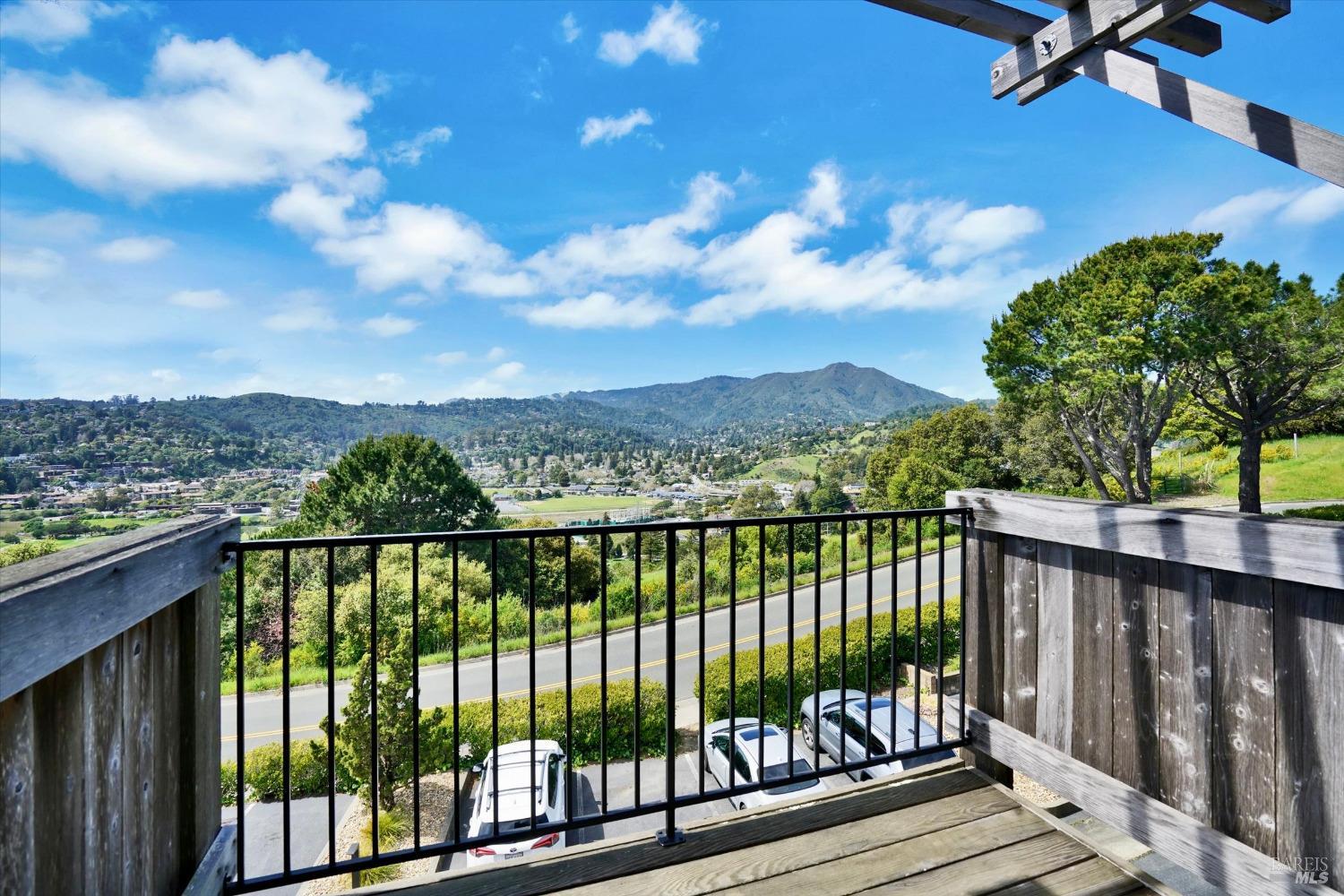 600 Seaver Drive Mill Valley, CA 94941 - Photo 15 of 30 a view of a balcony with wooden floor & fence