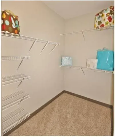 a view of a room with racks on the wall