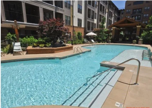 a view of a two chairs in the patio
