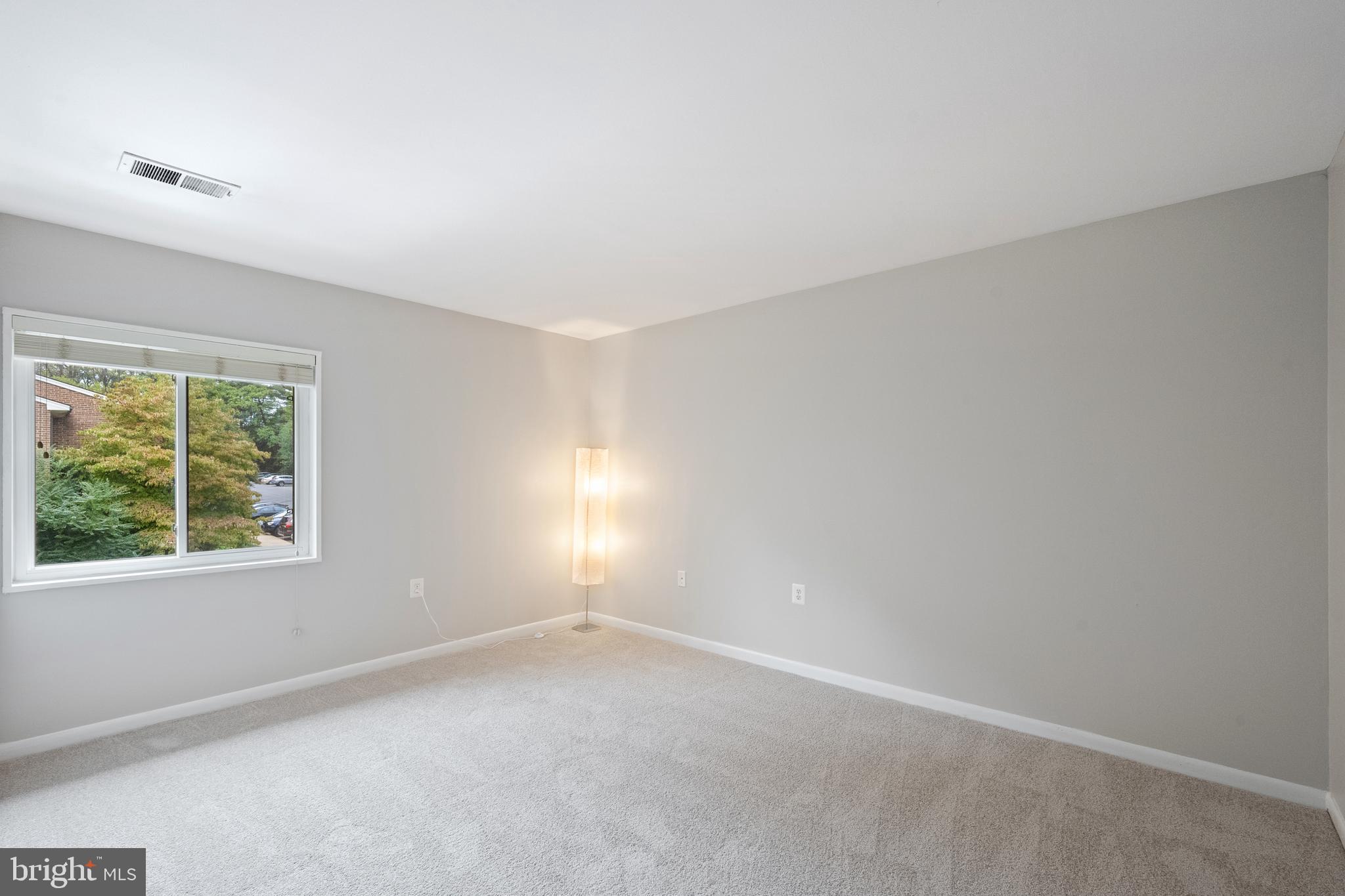 1434 Northgate Square, Unit 34/21B Reston, VA 20190 - Photo 13 of 44 an empty room with a window