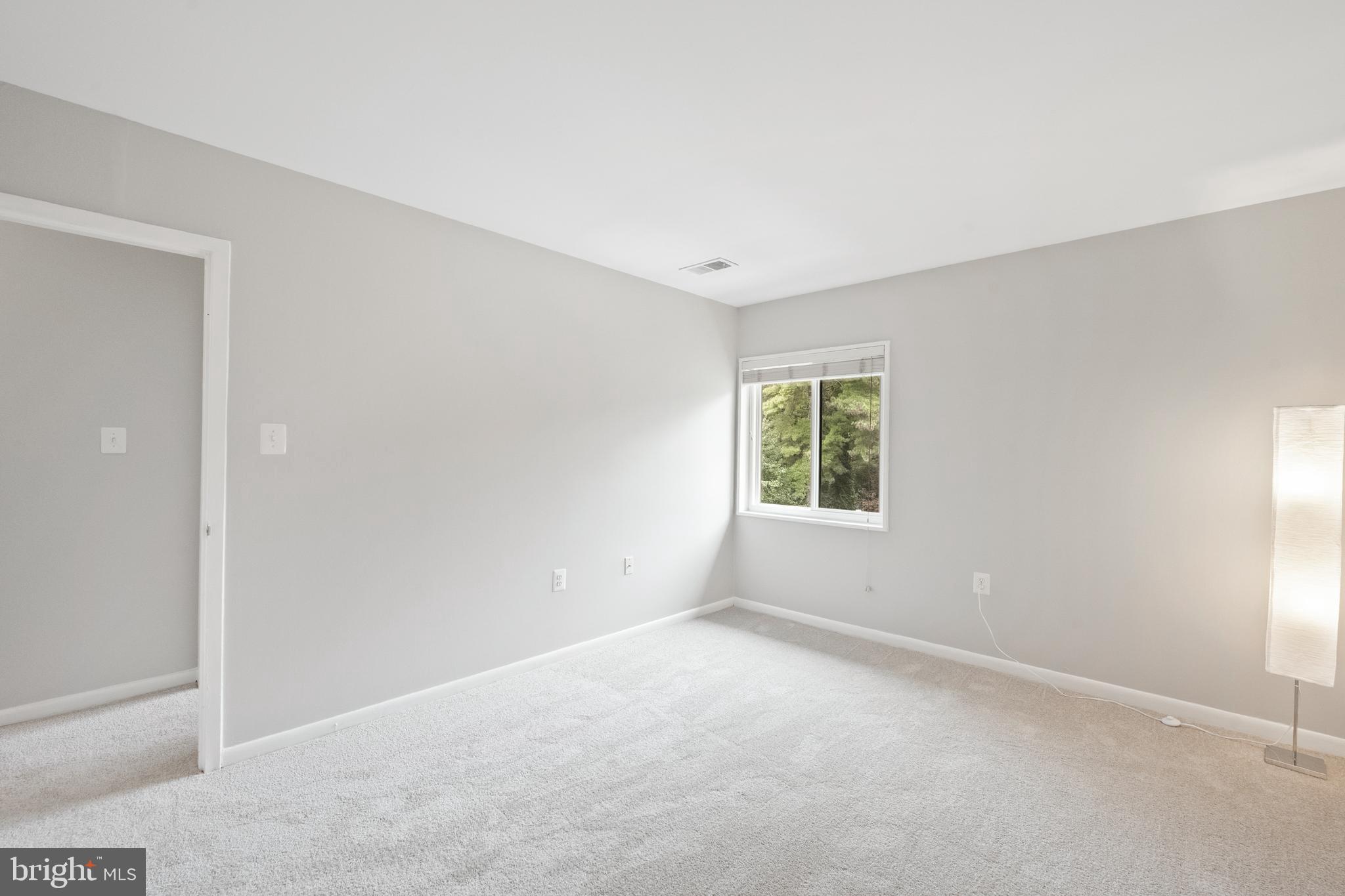 1434 Northgate Square, Unit 34/21B Reston, VA 20190 - Photo 15 of 44 an empty room with windows