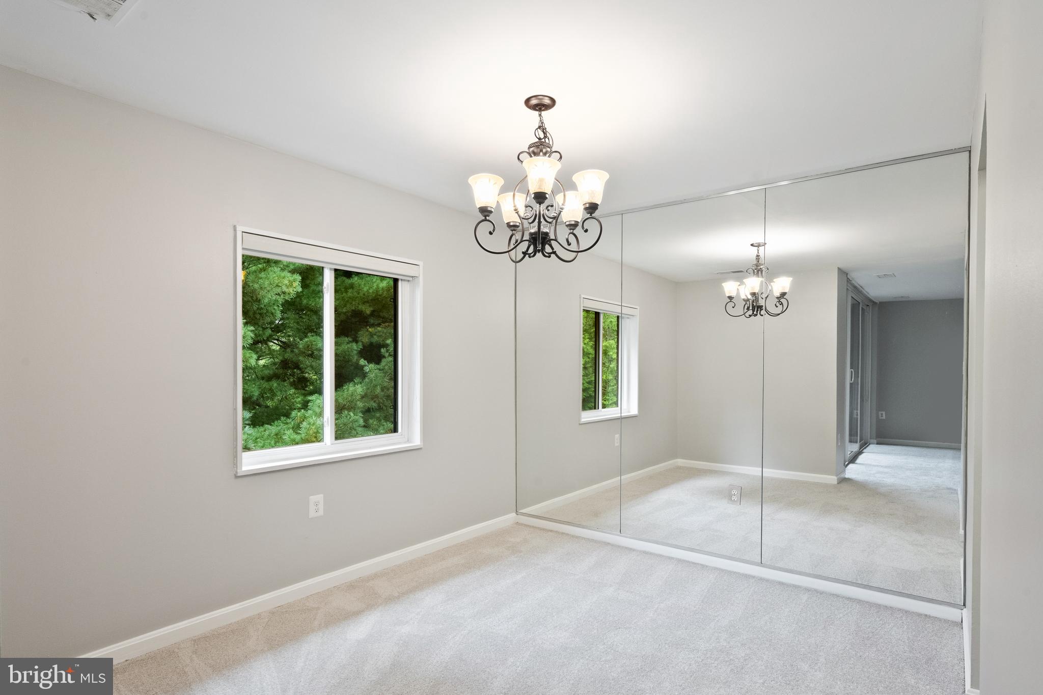 1434 Northgate Square, Unit 34/21B Reston, VA 20190 - Photo 6 of 44 a view of a chandelier in a room