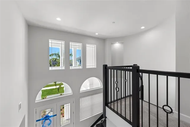 a view of entryway with stairs and wooden floor