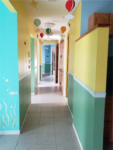 a room with cabinets and window