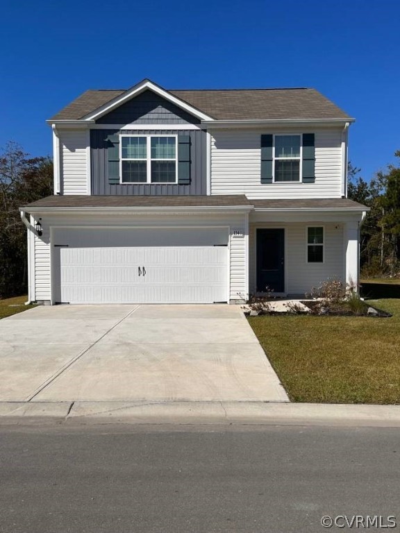 17266 George Ruffin Road Milford, VA 22514 - Photo 1 of 12 a front view of a house with a yard