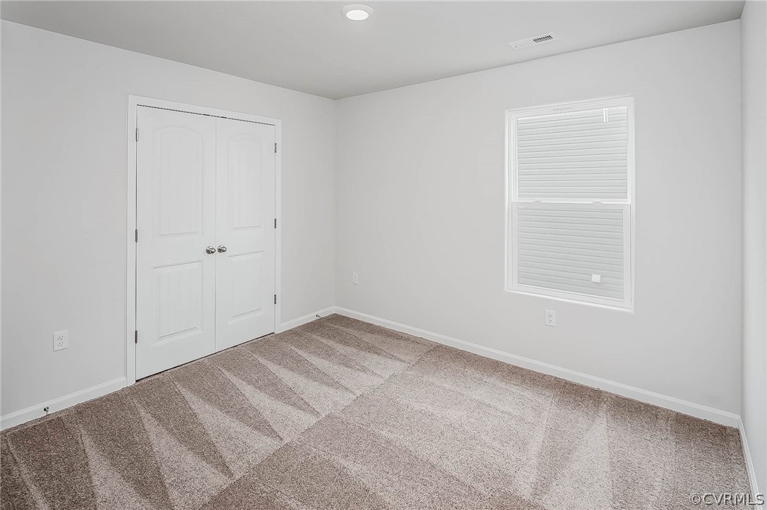 17266 George Ruffin Road Milford, VA 22514 - Photo 12 of 12 a view of an empty room with a window