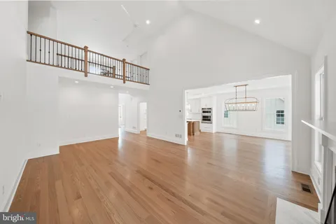 a view of a livingroom with wooden floor