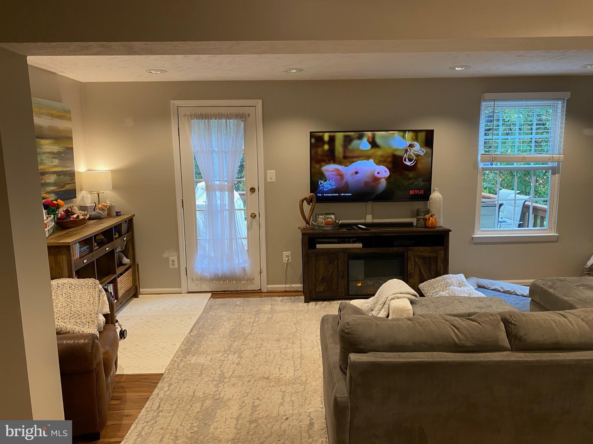 1507 Autumn Ridge Circle Reston, VA 20194 - Photo 3 of 6 Living room with new flooring and recessed lightin