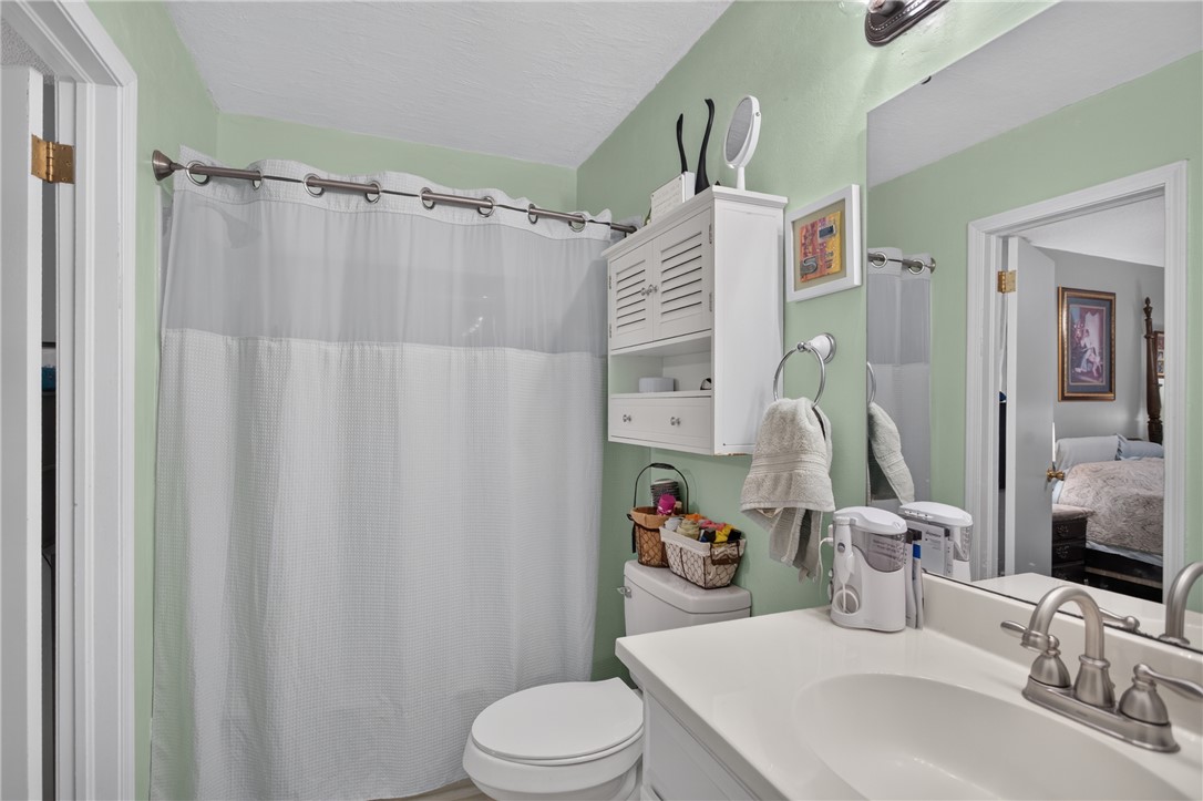 104 Laurel Lane Seneca, SC 29678 - Photo 17 of 36 A well-lit bathroom provides a comfortable, inviting atmosphere for daily routines.