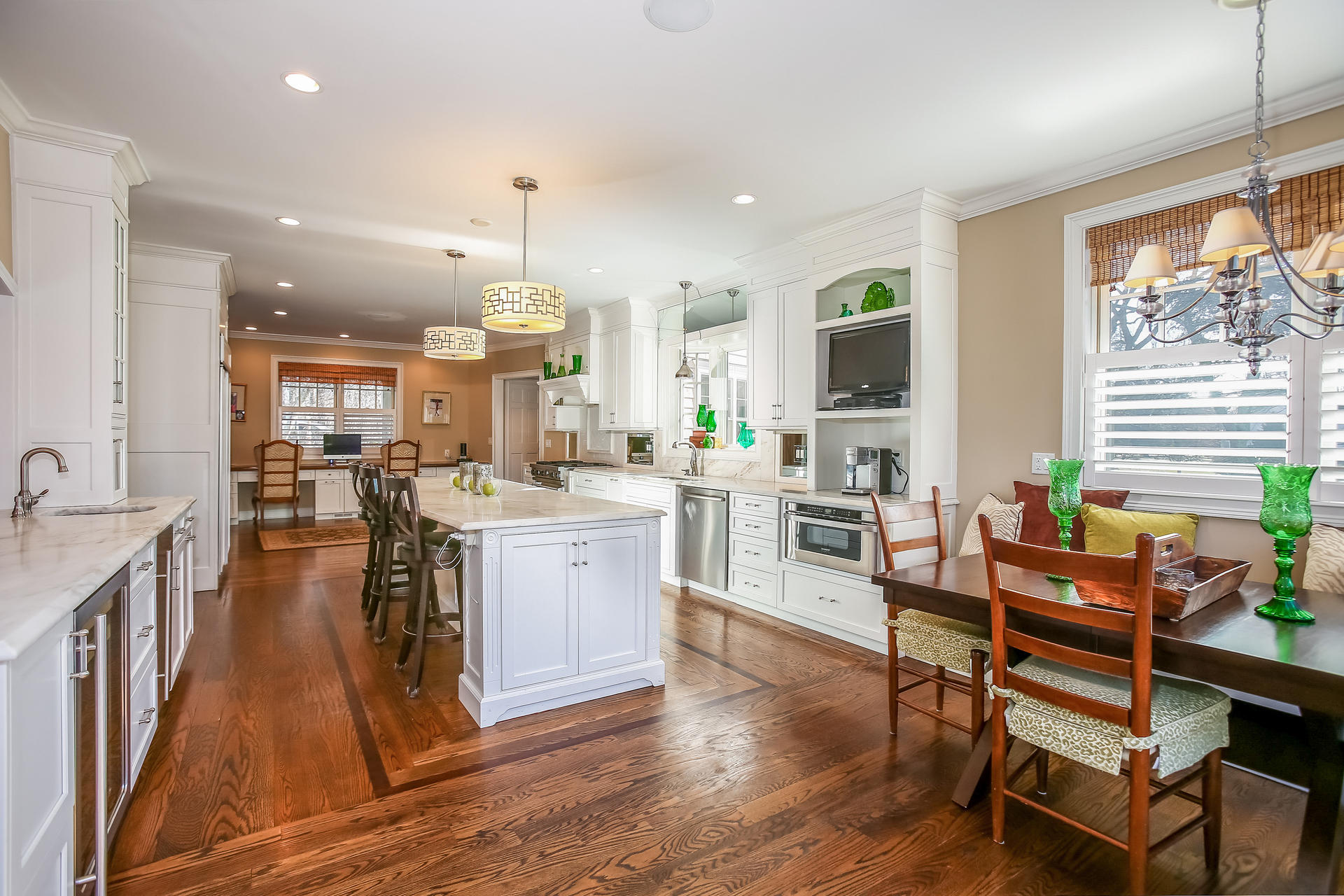 228 Ponus Ridge Road New Canaan, CT 06840 - Photo 12 of 47 a living room with stainless steel appliances kitchen island granite countertop furniture and a kitchen view