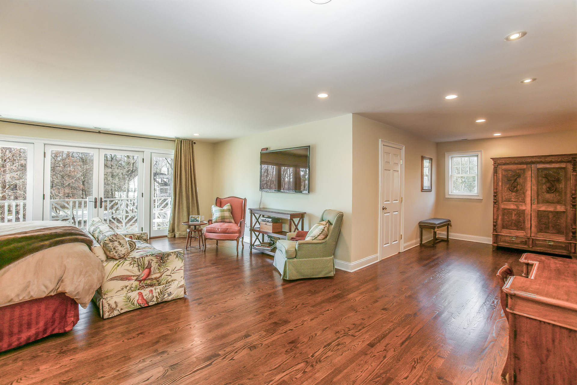 228 Ponus Ridge Road New Canaan, CT 06840 - Photo 20 of 47 a living room with furniture and wooden floor