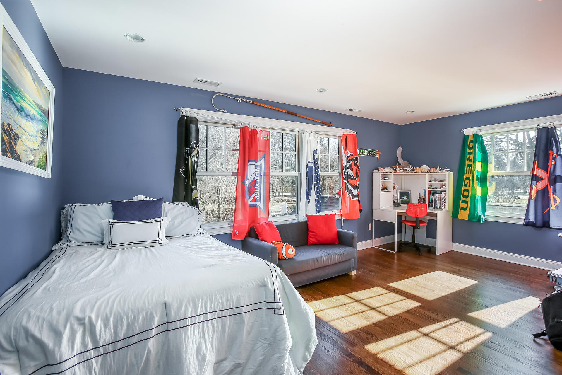 228 Ponus Ridge Road New Canaan, CT 06840 - Photo 24 of 47 a bedroom with a bed and a large window