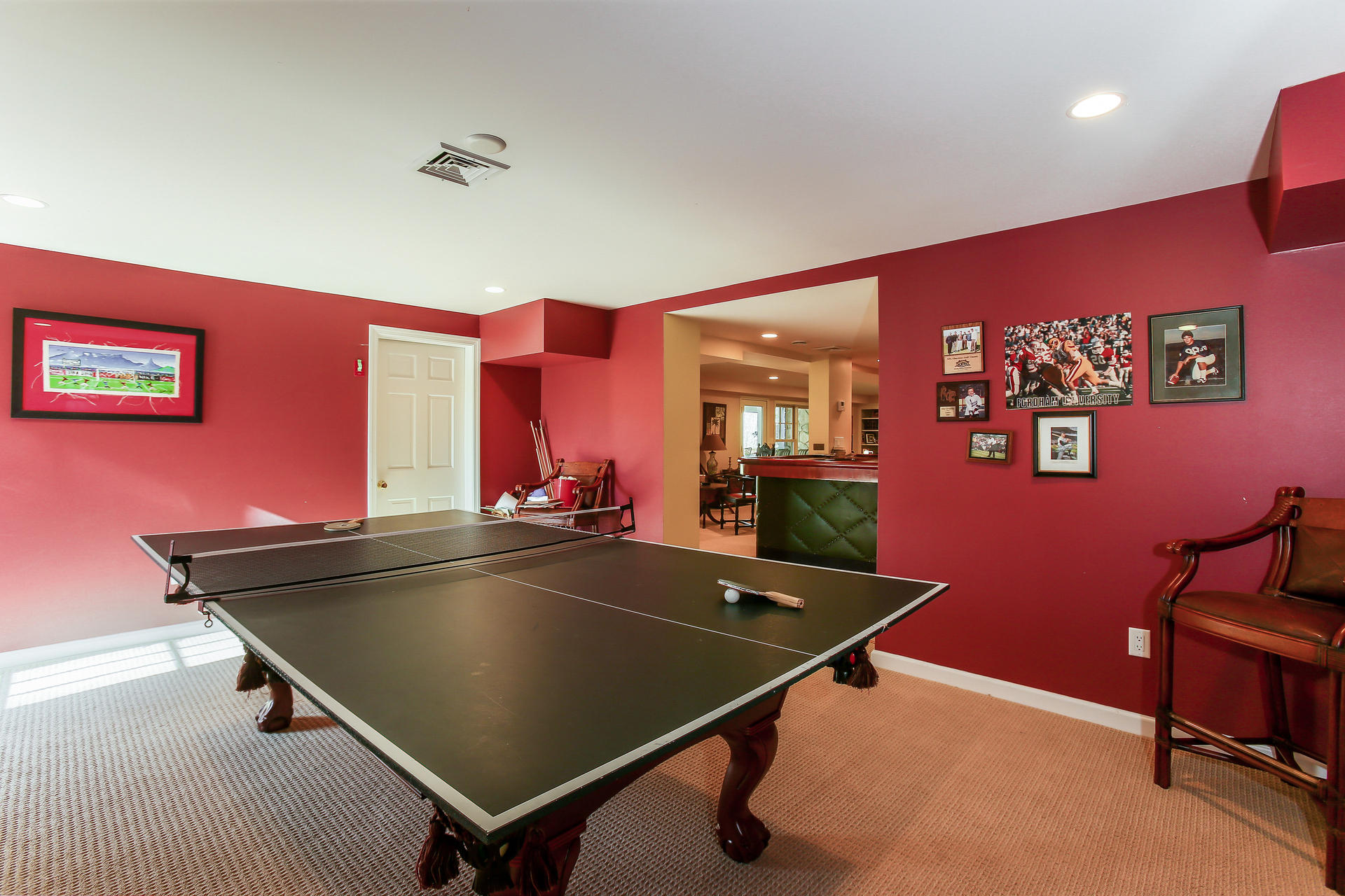 228 Ponus Ridge Road New Canaan, CT 06840 - Photo 29 of 47 a room with pool table and wall paintings